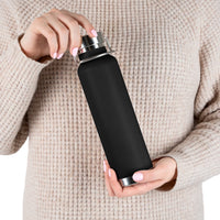 body view of person holding Copper Vacuum Insulated Bottle, 22oz